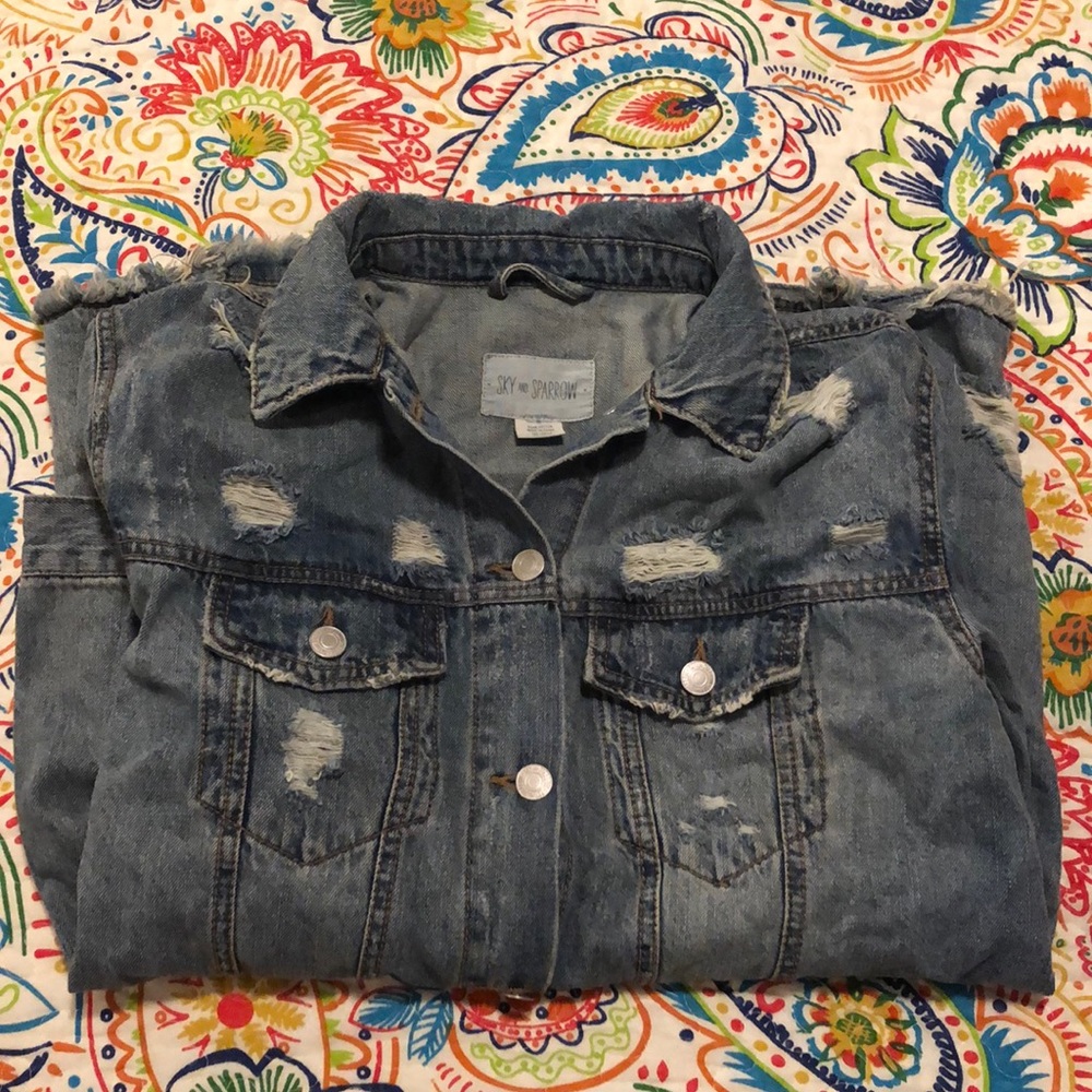 Over sized distressed denim jacket